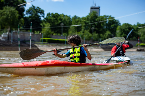 Boy enjoys kayaking training