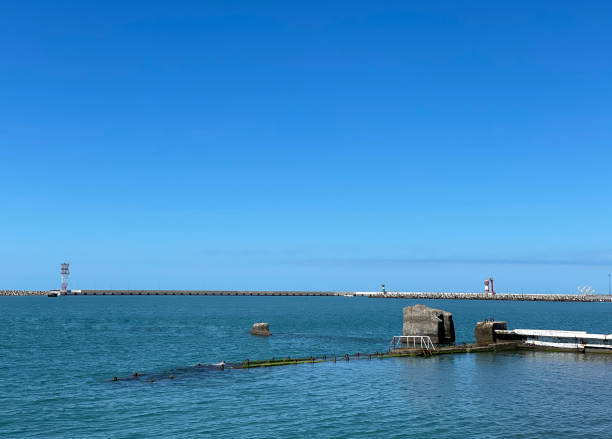 istock seascape, blue calm sea and blue sky 1321114633