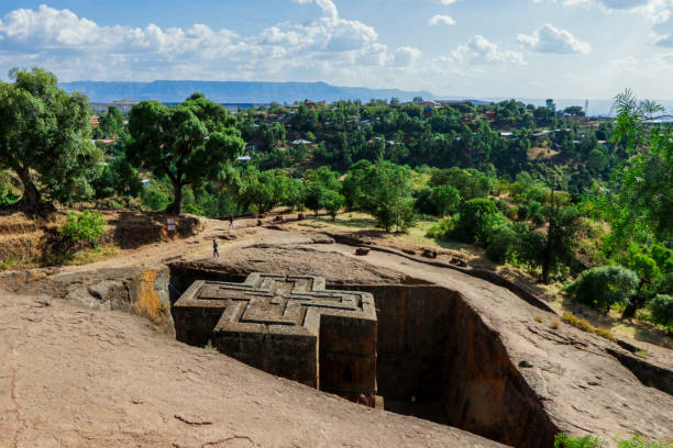 Main View to the Church of Saint George, one of many churches hewn into the rocky hills of Lalibela Main View to the Church of Saint George, one of many churches hewn into the rocky hills of Lalibela, Ethiopia the church of saint george lalibela ethiopia stock pictures, royalty-free photos & images