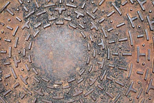 Cast iron surface with ornaments closeup