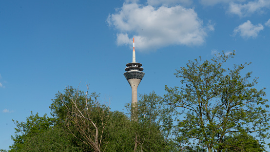 Rheinturm Tower in Düsseldorf Germany with cloudy skies