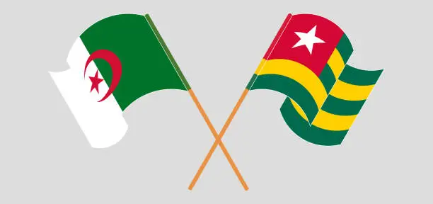 Vector illustration of Crossed and waving flags of Togo and Algeria