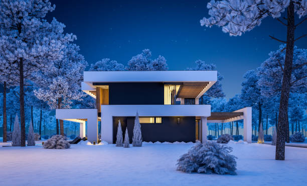 istock 3d rendering of modern house in luxurious style in winter night 1321135302