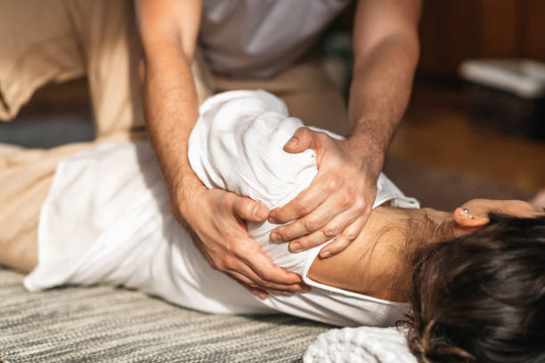 istock Traditional Thai Massage - Frozen Shoulder Treatment 1321136828