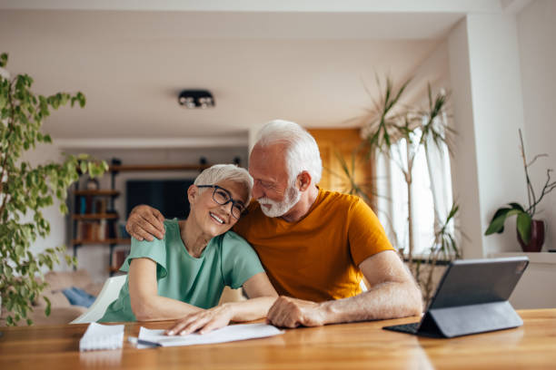 istock Senior husband, passionately hugging his wife. 1321137601