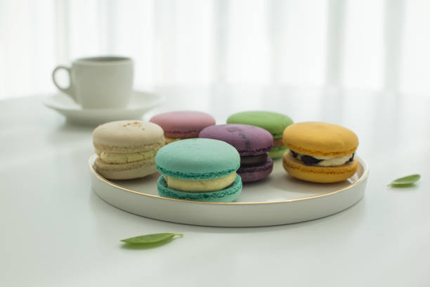 istock Sweet colorful macarons isolated on white background. 1321141996