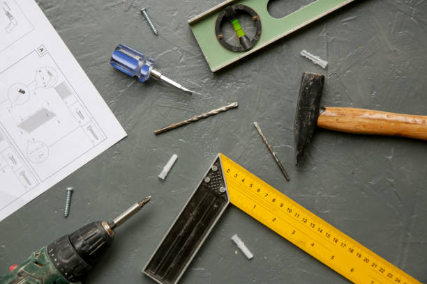 istock Tools on wooden table top view. Handicraft and hobby equipment. 1321144195