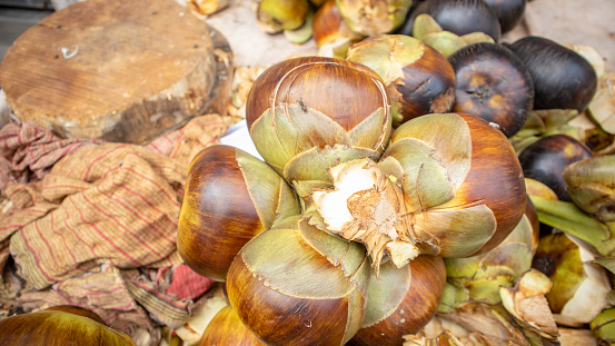 Street vendor selling ripe Indian palm in summer at street of Dhaka, Bangladesh. This Pictures has taken outdoor with canon eos m50.