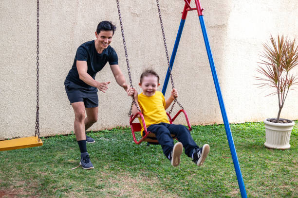 istock Father and son at the playground. 1321147010
