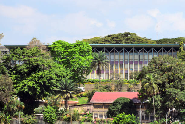 The Ivorian Presidential Palace and gardens, Plateau, Abidjan, Ivory Coast Abidjan, Ivory Coast / Côte d'Ivoire: completed in 1961, the presidential palace of Abidjan was designed by the French architect Pierre Dufau in international style, and paid by the French Republic. abidjan skyline stock pictures, royalty-free photos & images