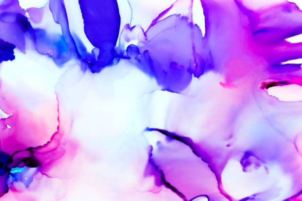 Abstract art done with Alcohol Ink on Synthetic plastic paper. Pink, Purple, and white design with swirling motion. stock photo