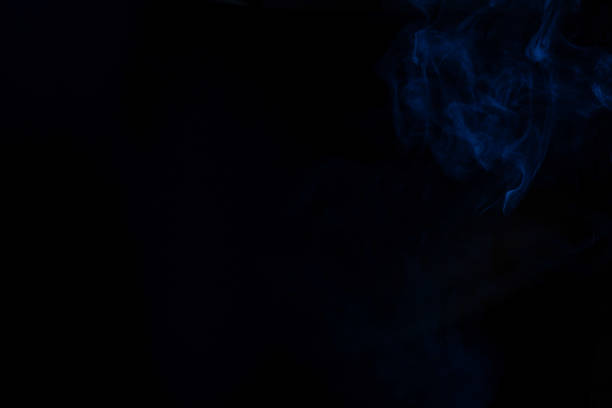 istock Blue and pink steam on a black background. 1321162557