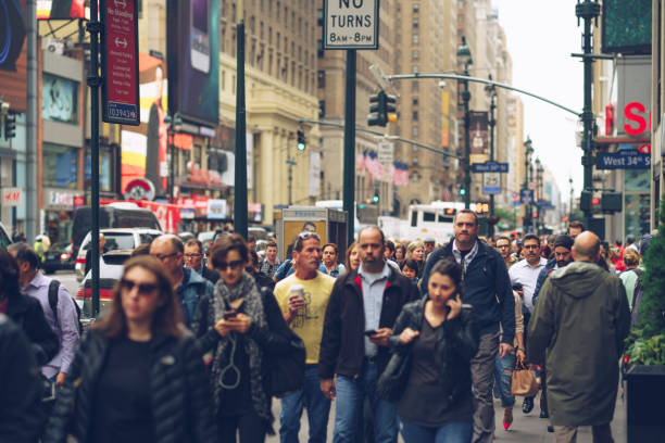 istock Crowd of people in NYC 1321163565