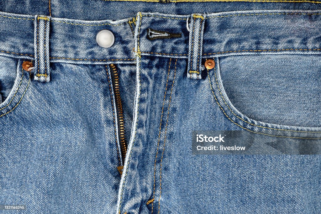 Unzipped Blue Jeans close up of unzipped denim blue jeans Copper Stock Photo