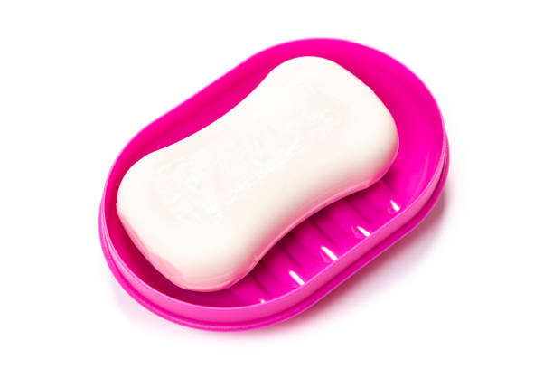 istock Soap in PLASTIC COLORED soap dish isolated on white background 1321165861