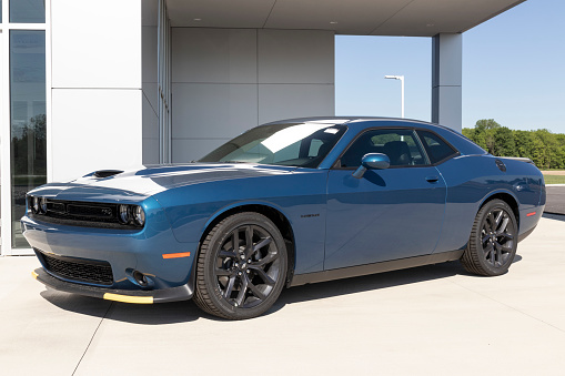 Tipton - Circa May 2021: Dodge Challenger display at a Chrysler dealership. The Stellantis subsidiaries of FCA are Chrysler, Dodge, Jeep, and Ram.