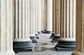 High marble columns as background, architectural design in style of classicism. Architectural pattern