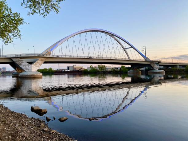 istock Northeast Minneapolis Riverfront and Lowry Bridge at Sunset 1321167608