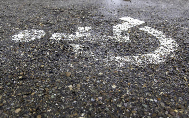 istock Handicapped sign on the asphalt 1321168884