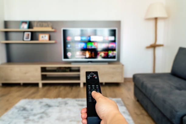 istock Looking the tv at home 1321169024
