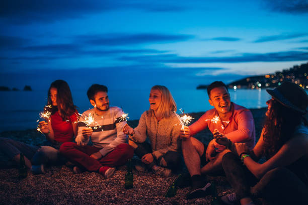istock Friends having beach party 1321169927