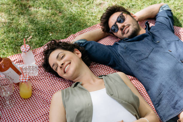 istock couple on picnic relaxing 1321170261