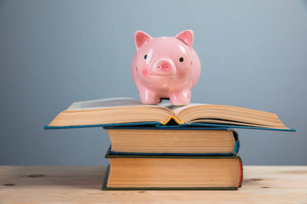 istock piggy bank on books 1321170265