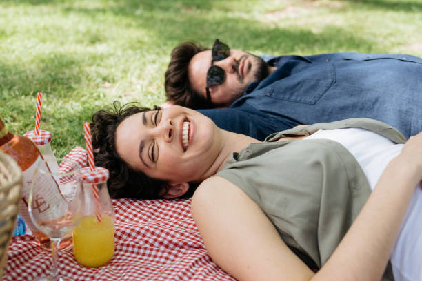 istock couple relaxing on picnic 1321170326