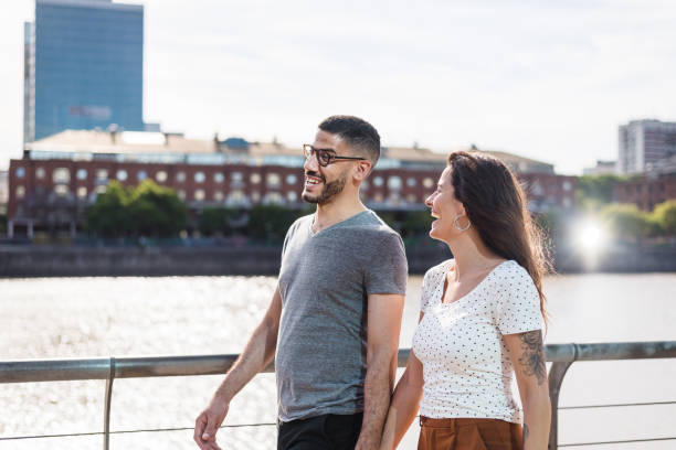 istock smiling couple in the city 1321170360