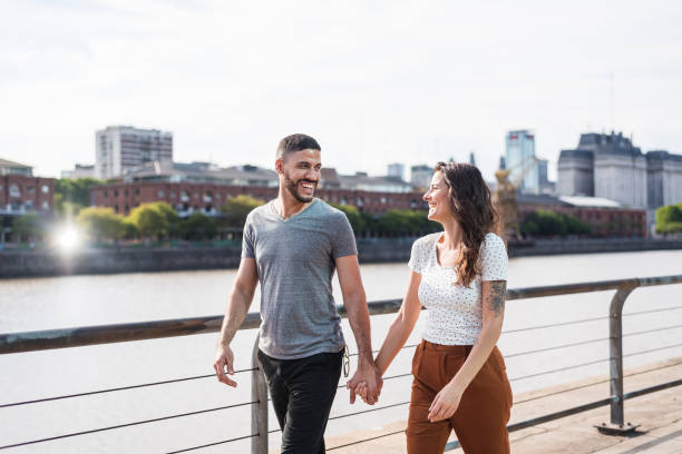 istock Couple walking in the city 1321171148