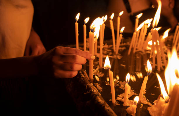 istock light candles in the church 1321171615