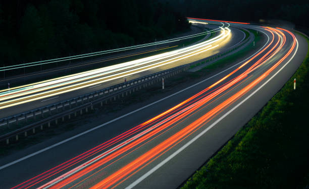 istock abstract red car lights at night. long exposure 1321171654