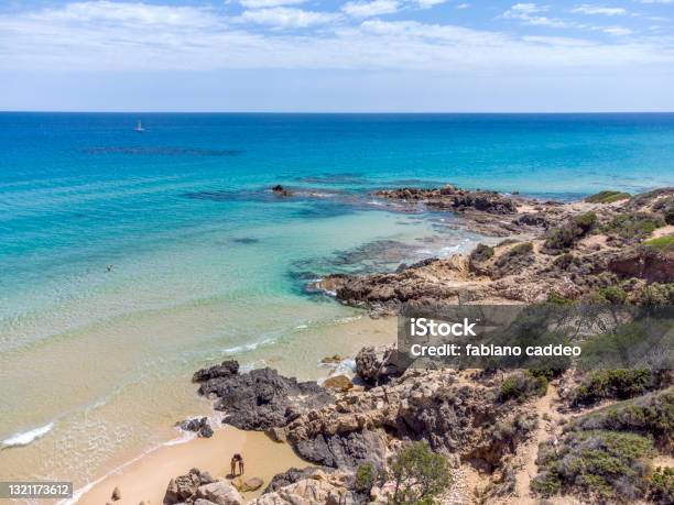 Crystal Clear And Tropical Sea At Del Morto Beach View From Flying Drone Chia Beach Stock Photo - Download Image Now