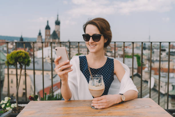 istock Woman in restaurant eating dessert 1321175146