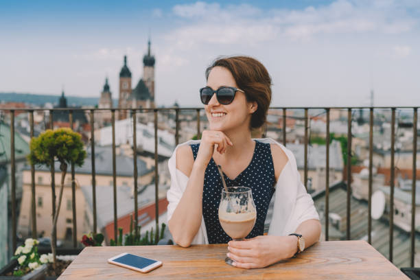 istock Woman in restaurant eating dessert 1321175240