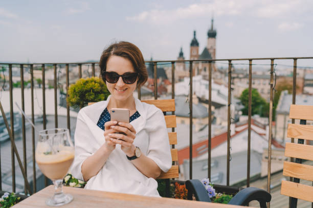 istock Woman in restaurant eating dessert 1321175287
