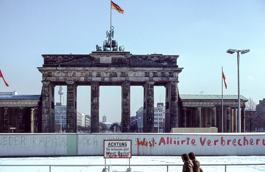 Berlin, Germany, January 20, 1983 - Historic photo of the Brandenburg Gate in Berlin from 1983 seen from West Berlin