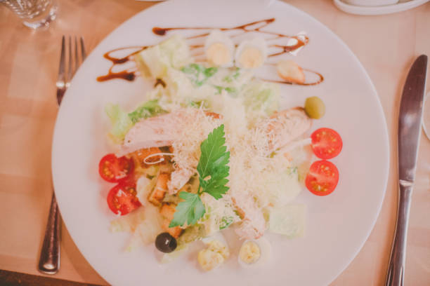 istock The Caesar salad prepared on the classical recipe. 1321179340