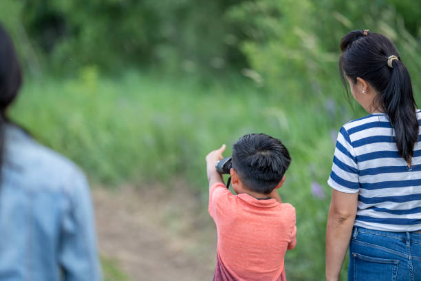 istock Family curiosity in nature 1321182993