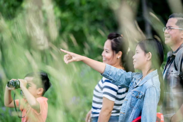 istock Family curiosity in nature 1321182998