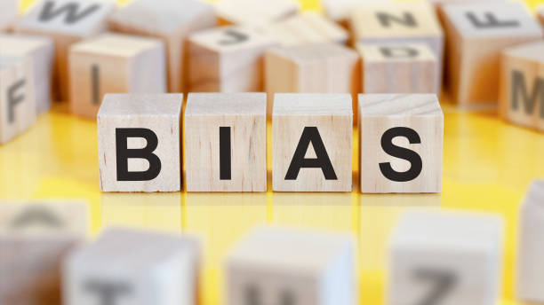 istock word bias written on wood blocks, concept 1321183110