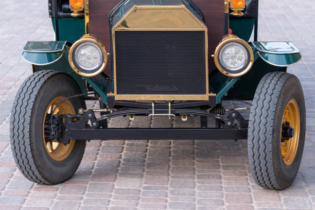 istock turquoise retro vintage car close-up. front view 1321183304
