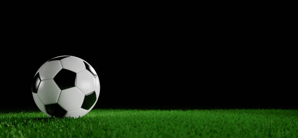 istock Soccer ball in the stadium on a black background. 3D rendering illustration. 1321184801