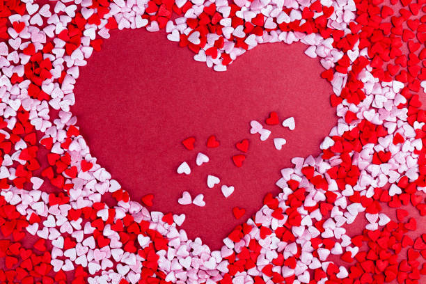 istock red and white sweet heart shaped candies 1321186225