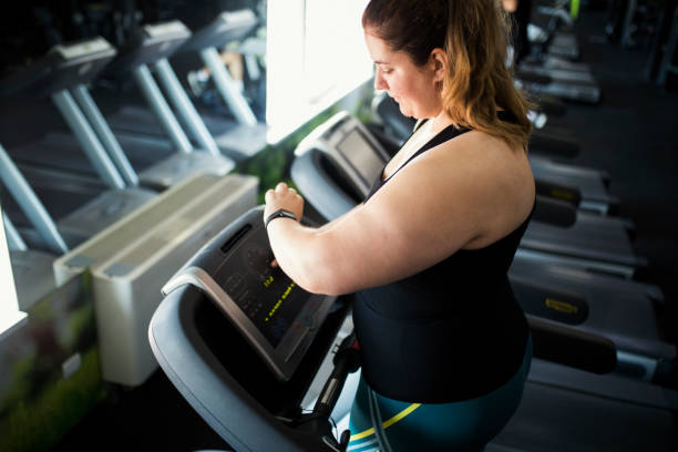 istock Overweight women at gym 1321194358