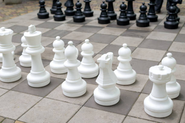 istock Chess Pieces standing on the Chessboard before the tournament. 1321197158