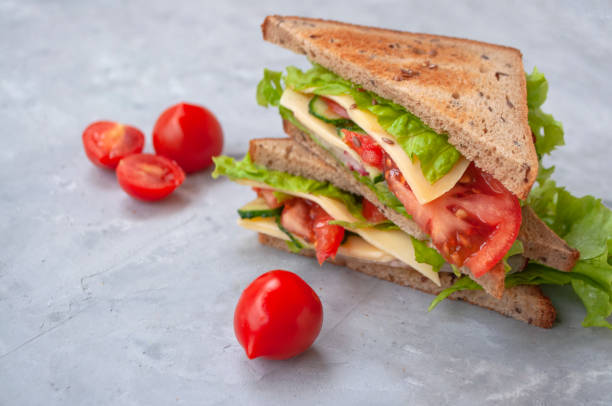 istock Freshly cooked rye bread sandwich with delicious vegetables. 1321200989