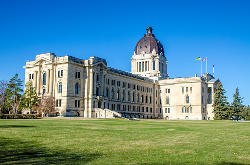 Side view of facade of Saskatchewan Legislative Building during day of springtime