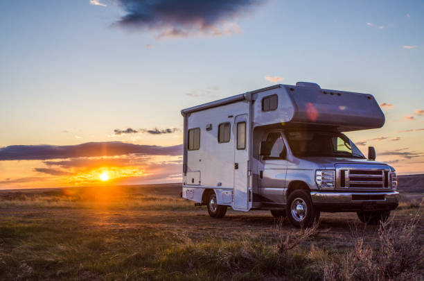 Motor home and sunset Motor home and sunset during springtime camping stock pictures, royalty-free photos & images