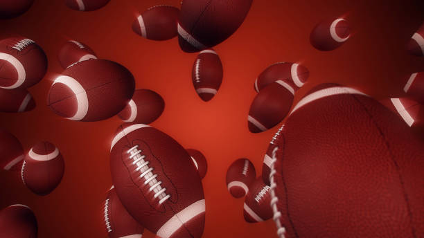 istock American Football balls falling 1321202777